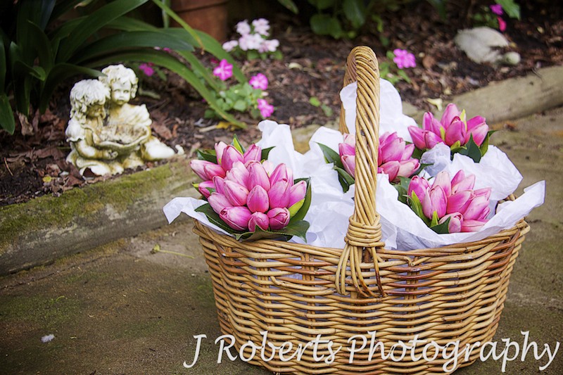 Flower girl bouquets in basket - wedding photography sydney